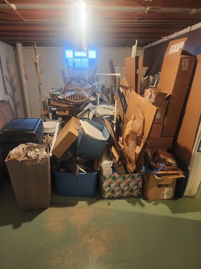 Roll-off dumpster container at job site for 8 Yard Dumpster Rental in Naranja